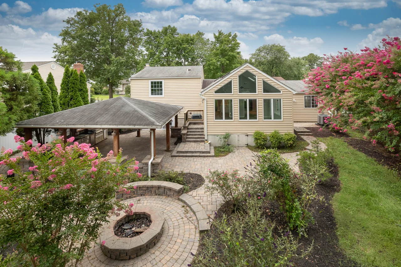 Landscaped yard and fire-pit area