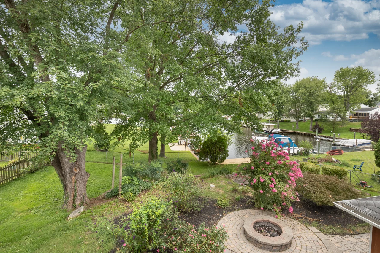 Water views beyond the landscaped yard