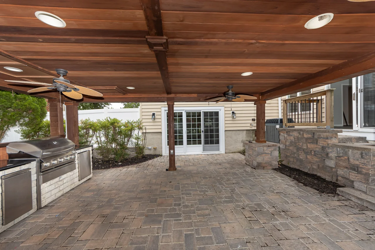 Covered paver patio and rear doors