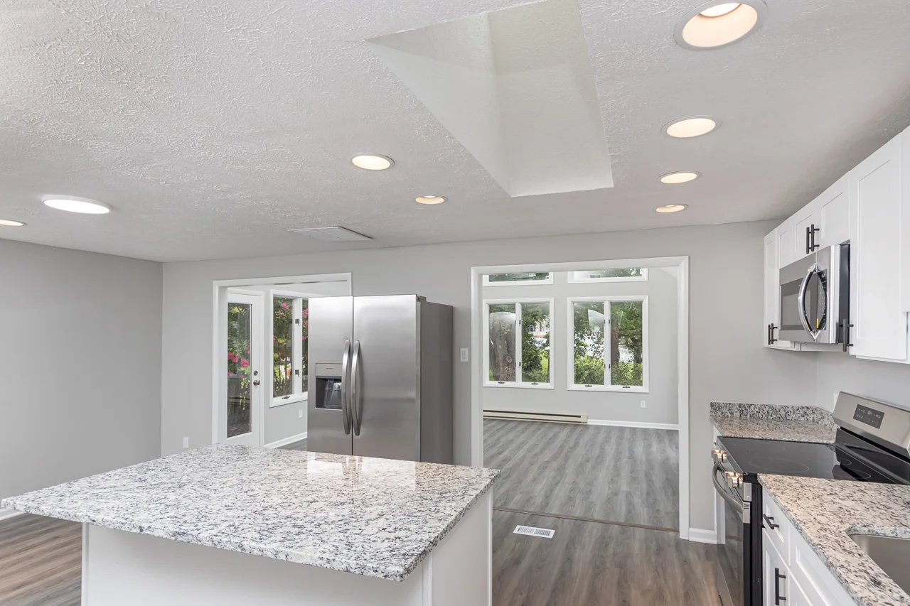 Kitchen island and stainless-steel refrigerator