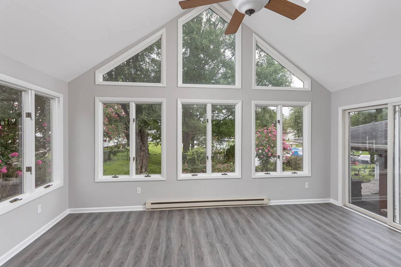 Sunroom windows overlooking the yard