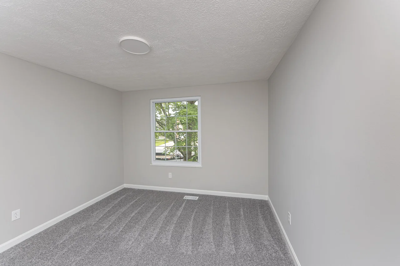 Bedroom with a single window