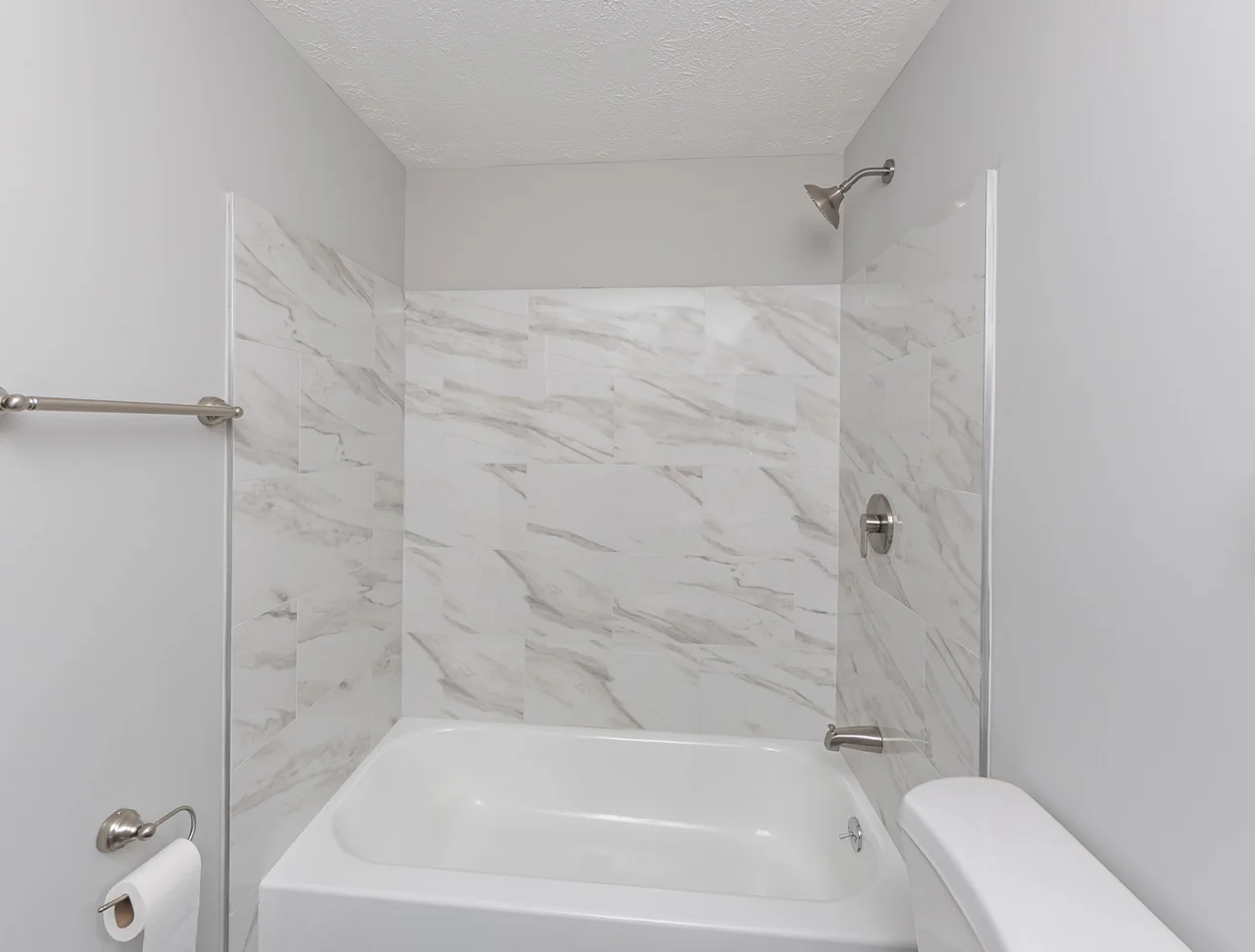 Tiled tub-and-shower bathroom