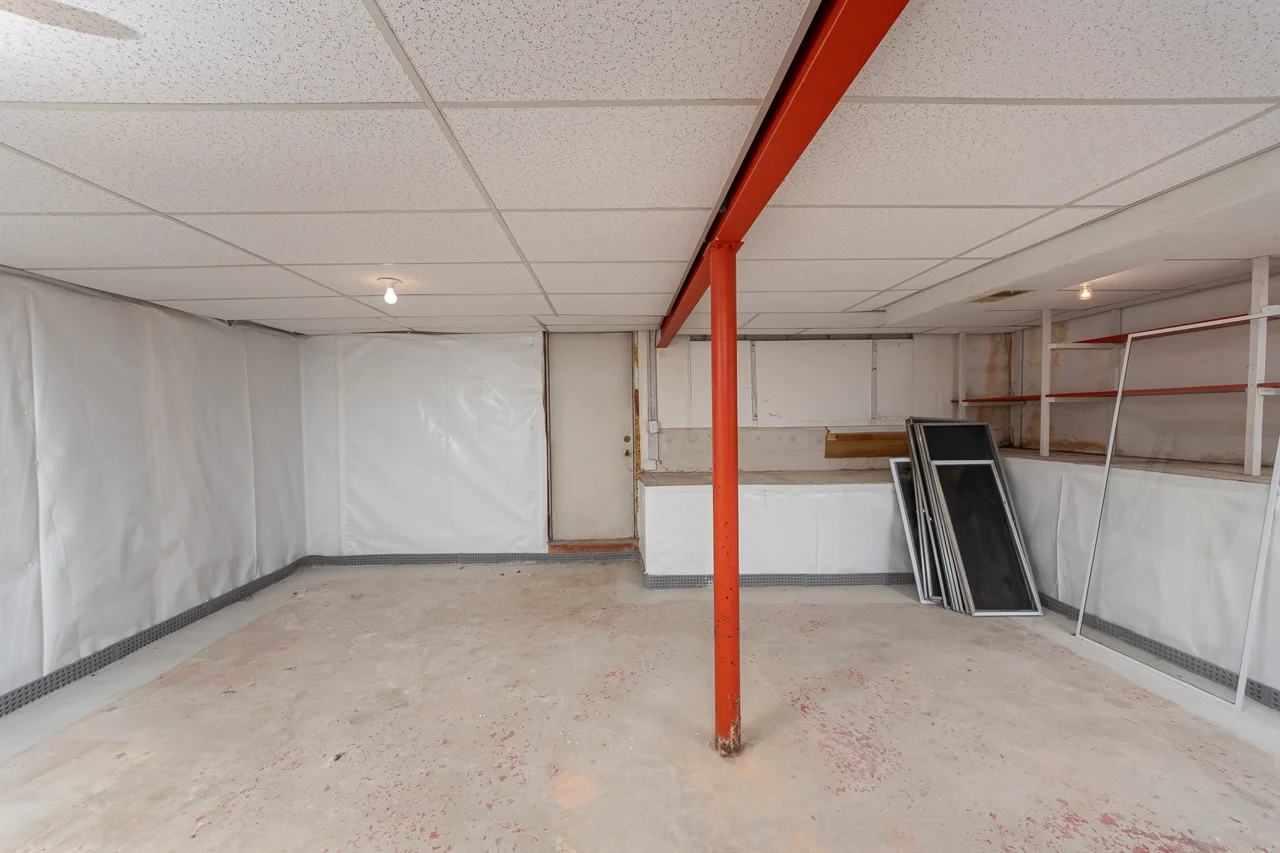 Unfinished lower-level storage area